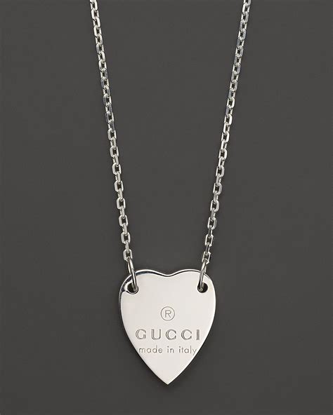 gucci blue heart necklace|heart necklace with Gucci trademark.